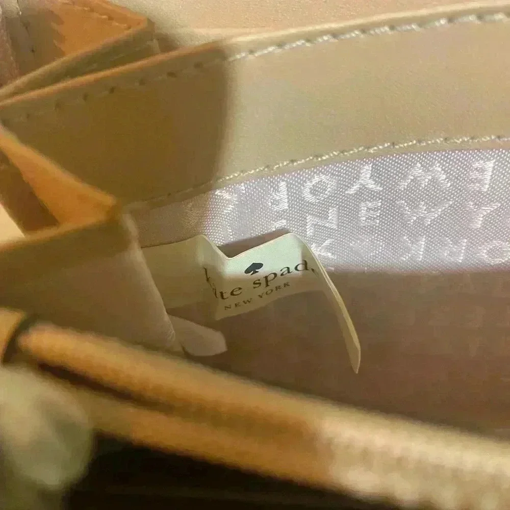 Kate spade metallic bronze leather wallet